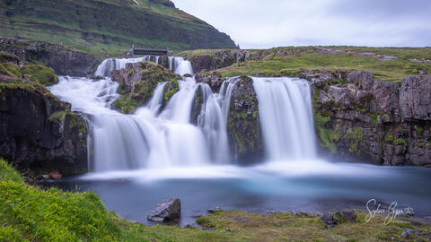 scenic view of multiple waterfalls in a long-exposure