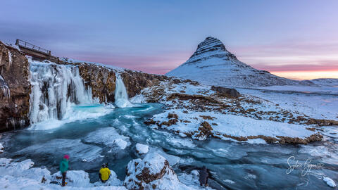 waterfall with snowy mountain