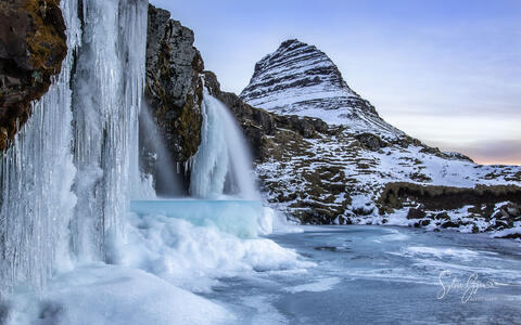 frozen waterfall with snow and ice